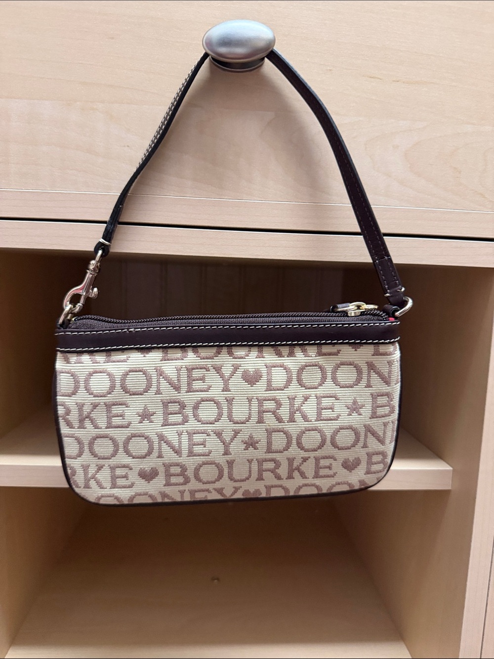 Dooney & Bourke Beige Logo Wristlet with Brown Trim and Strap